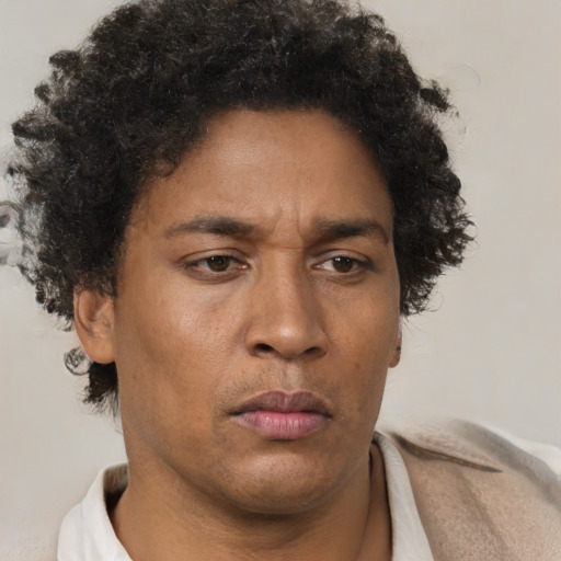 Neutral latino adult male with short  brown hair and brown eyes