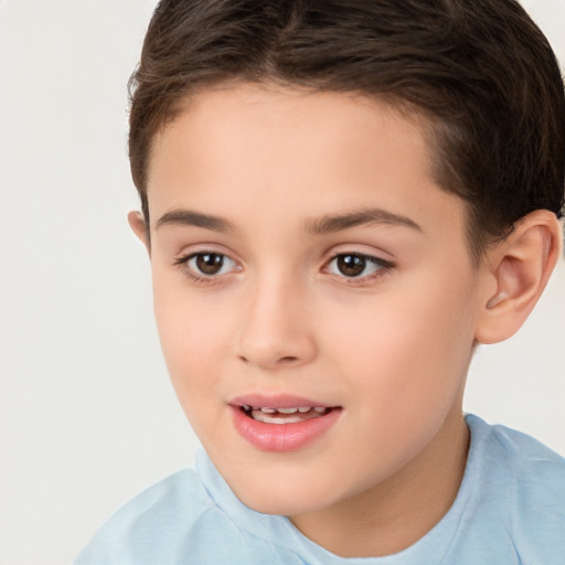 Joyful white child female with short  brown hair and brown eyes