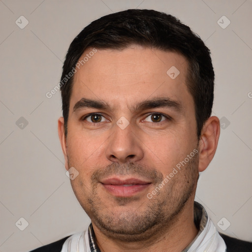 Neutral white young-adult male with short  brown hair and brown eyes