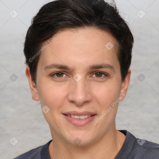 Joyful white adult female with short  brown hair and brown eyes