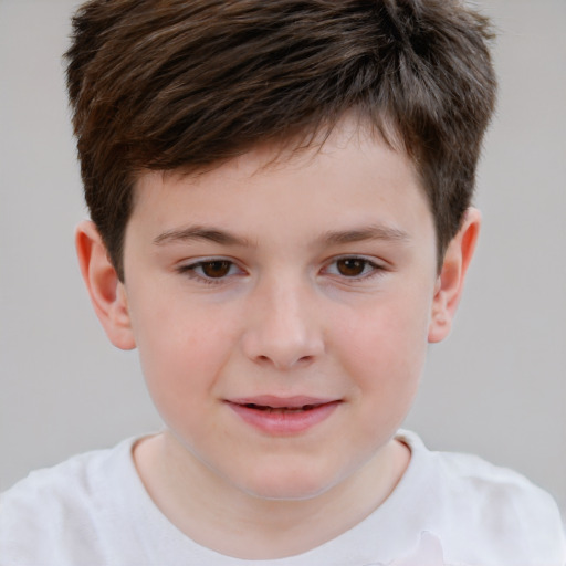 Joyful white child male with short  brown hair and brown eyes