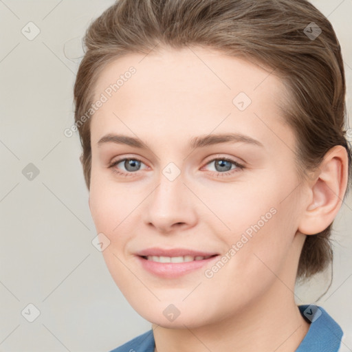 Joyful white young-adult female with medium  brown hair and grey eyes