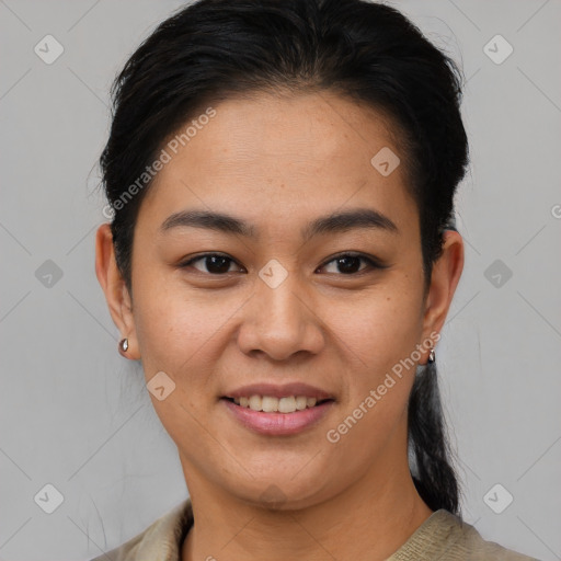 Joyful asian young-adult female with short  brown hair and brown eyes