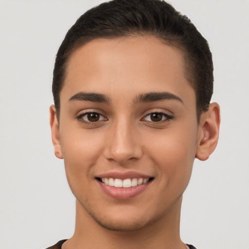 Joyful white young-adult female with short  brown hair and brown eyes