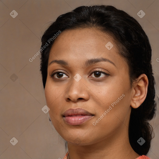 Joyful black young-adult female with medium  black hair and brown eyes