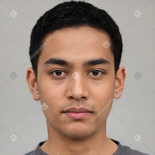 Neutral latino young-adult male with short  black hair and brown eyes