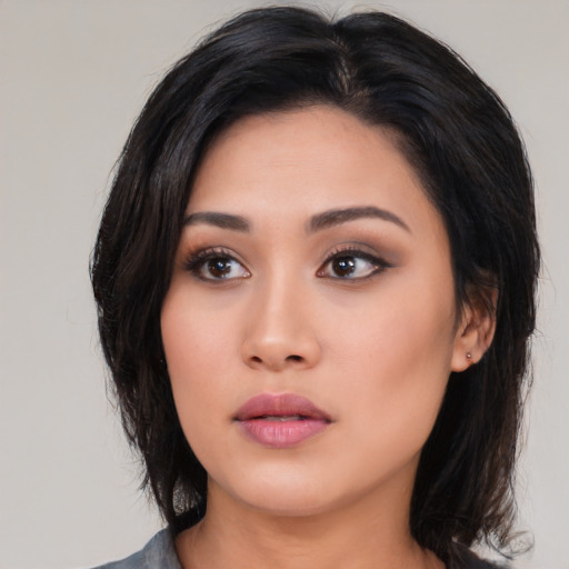 Neutral asian young-adult female with medium  black hair and brown eyes