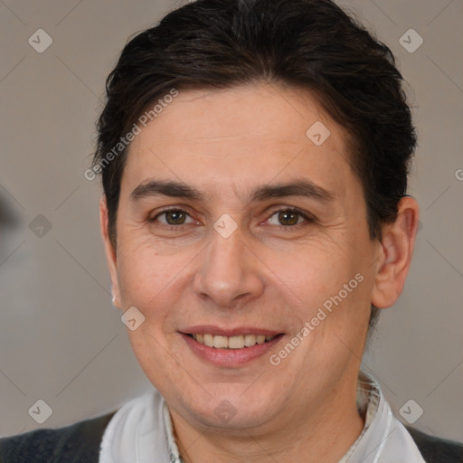 Joyful white adult female with short  brown hair and brown eyes