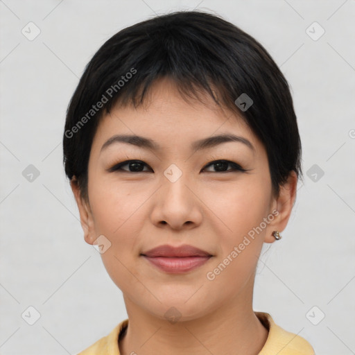 Joyful asian young-adult female with short  black hair and brown eyes