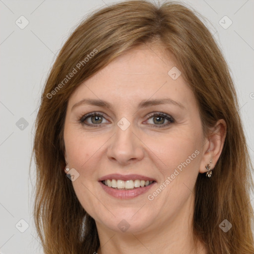 Joyful white adult female with long  brown hair and brown eyes