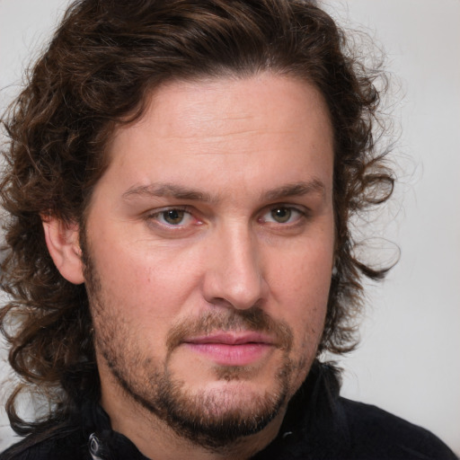 Neutral white adult male with medium  brown hair and green eyes