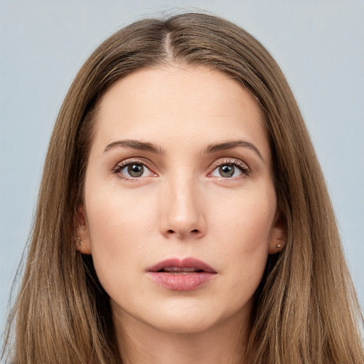 Neutral white young-adult female with long  brown hair and brown eyes