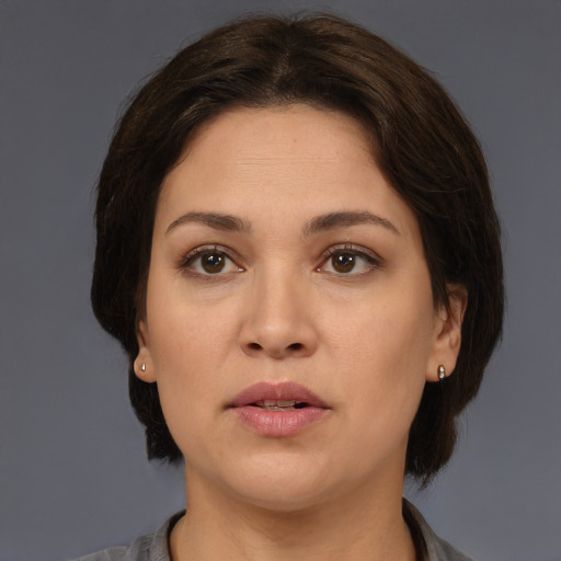 Neutral white young-adult female with medium  brown hair and brown eyes