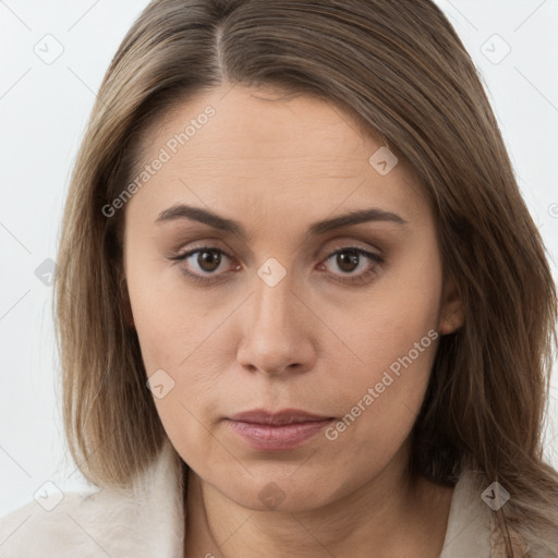 Neutral white young-adult female with long  brown hair and brown eyes