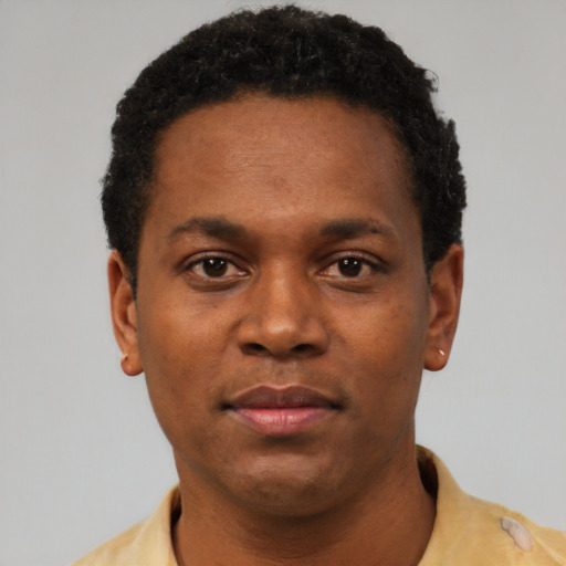 Neutral black young-adult male with short  black hair and brown eyes