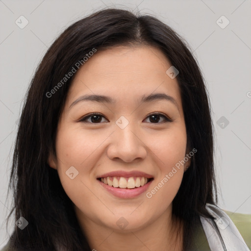 Joyful asian young-adult female with medium  brown hair and brown eyes