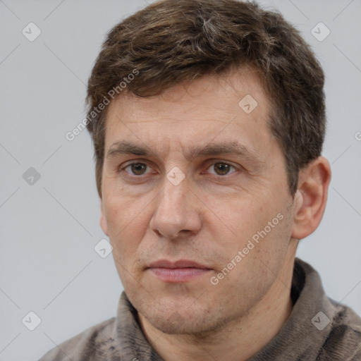 Neutral white adult male with short  brown hair and brown eyes