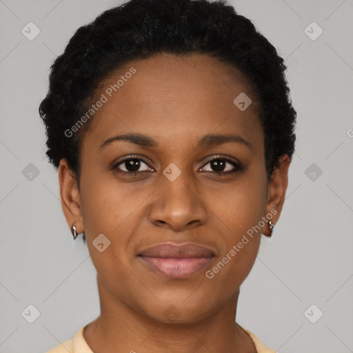 Joyful black young-adult female with short  black hair and brown eyes