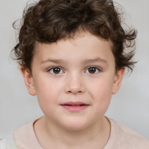 Joyful white child male with short  brown hair and brown eyes