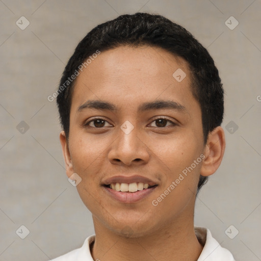 Joyful latino young-adult male with short  black hair and brown eyes