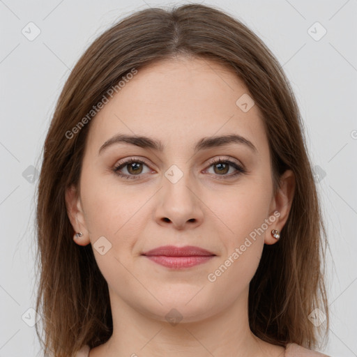 Joyful white young-adult female with long  brown hair and grey eyes