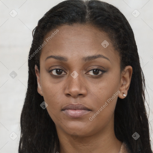 Neutral black young-adult female with long  brown hair and brown eyes