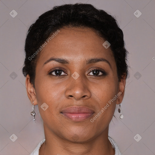 Joyful black young-adult female with short  brown hair and brown eyes