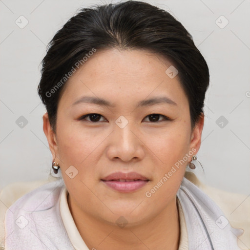 Joyful asian young-adult female with short  brown hair and brown eyes