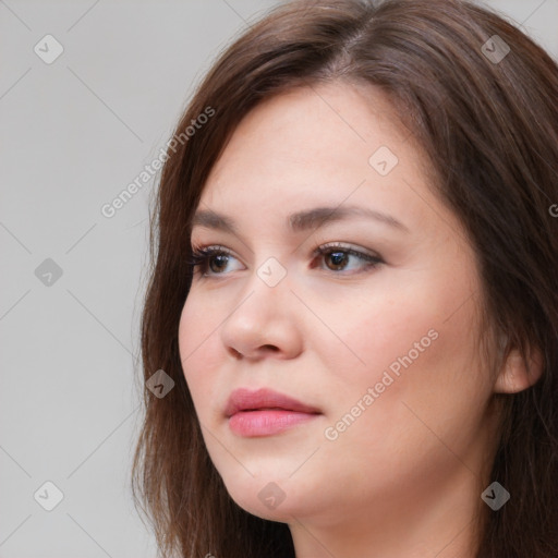 Neutral white young-adult female with long  brown hair and brown eyes