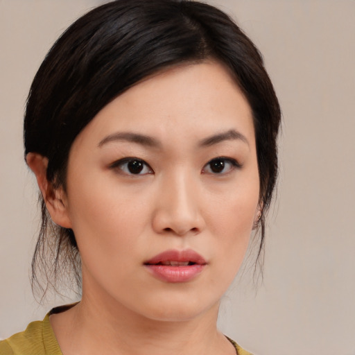 Neutral asian young-adult female with medium  black hair and brown eyes