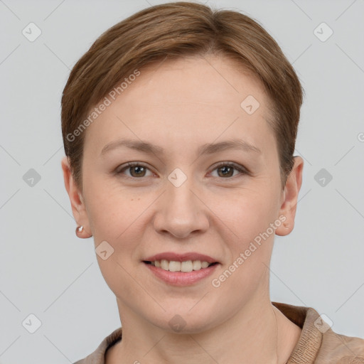 Joyful white young-adult female with short  brown hair and grey eyes