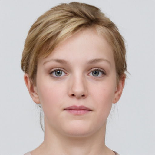 Neutral white young-adult female with medium  brown hair and grey eyes