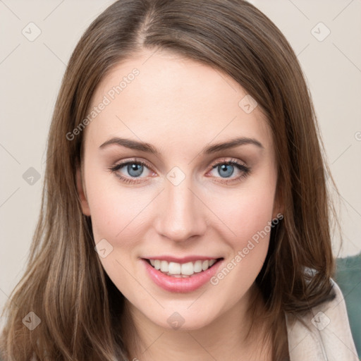 Joyful white young-adult female with long  brown hair and green eyes