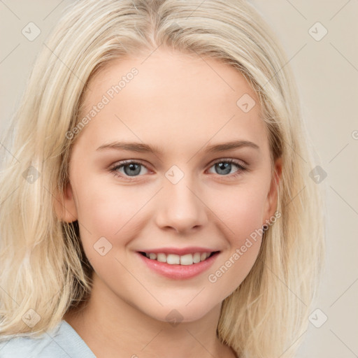 Joyful white young-adult female with medium  brown hair and blue eyes