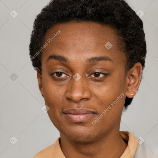 Joyful black adult female with short  brown hair and brown eyes