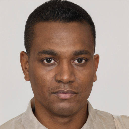 Neutral black young-adult male with short  brown hair and brown eyes