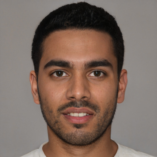 Neutral latino young-adult male with short  brown hair and brown eyes