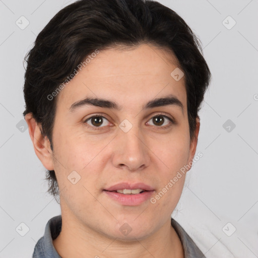 Joyful white young-adult male with short  black hair and brown eyes