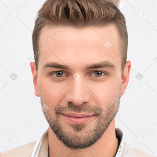 Joyful white young-adult male with short  brown hair and brown eyes