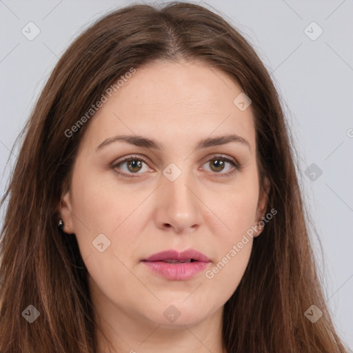 Joyful white young-adult female with long  brown hair and green eyes