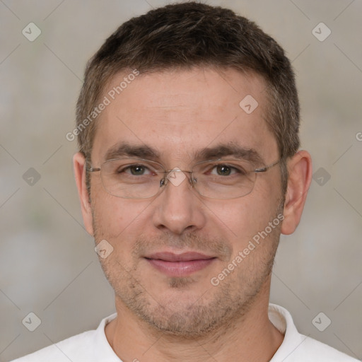 Joyful white adult male with short  brown hair and brown eyes