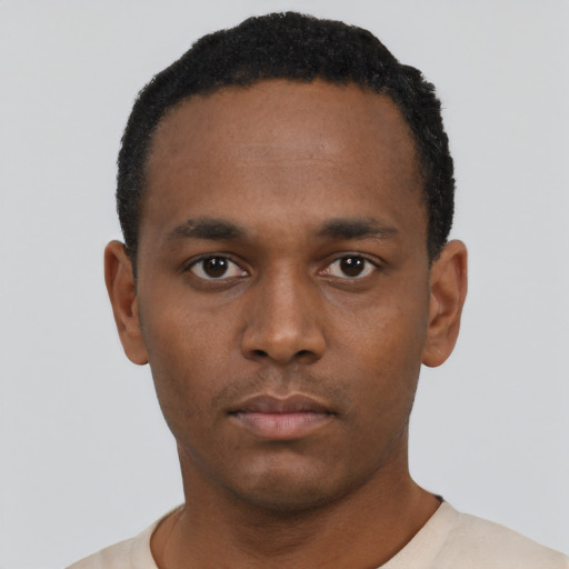 Neutral black young-adult male with short  black hair and brown eyes