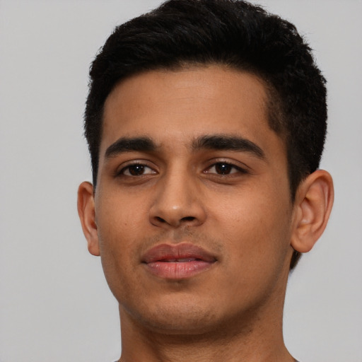 Neutral latino young-adult male with short  black hair and brown eyes
