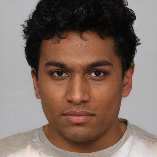 Neutral latino young-adult male with short  brown hair and brown eyes