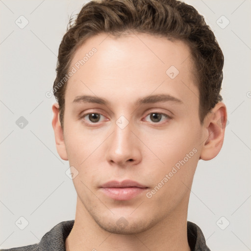 Neutral white young-adult male with short  brown hair and grey eyes