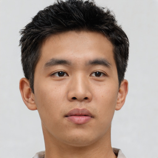 Neutral asian young-adult male with short  brown hair and brown eyes