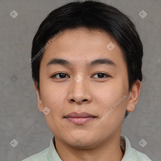 Joyful asian young-adult male with short  black hair and brown eyes