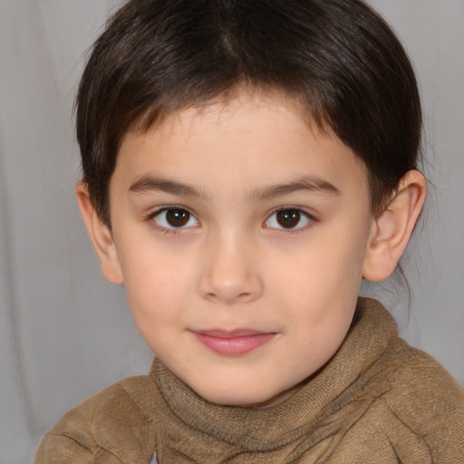 Joyful white child female with short  brown hair and brown eyes