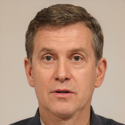 Neutral white middle-aged male with short  brown hair and brown eyes