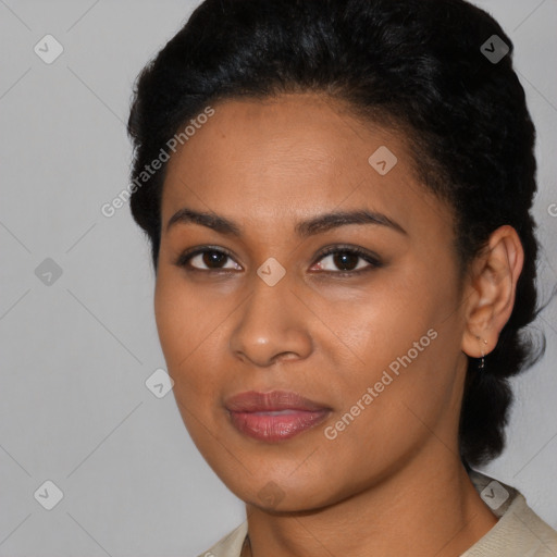 Joyful latino young-adult female with short  black hair and brown eyes